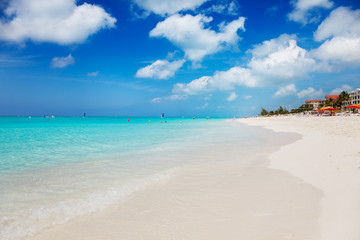 Fototapeta na wymiar Wide white sands of Grace Bay Beach by the Alexandra Resort, Turks and Caicos