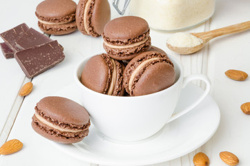 French traditional dessert chocolate macarons with coffee cream