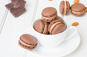 French traditional dessert chocolate macarons with coffee cream