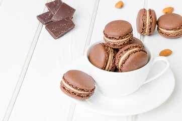 French traditional dessert chocolate macarons with coffee cream