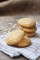 Homemade oatmeal cookies on checkered kitchen towel
