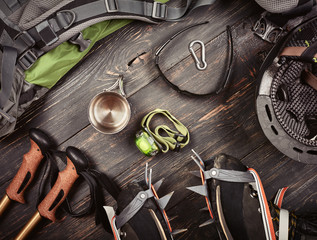 Climber accessories set on dark wooden background