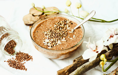 raw porridge from flax seeds with cocoa, banana,.healthy breakfa