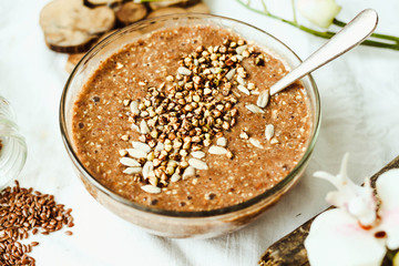 raw porridge from flax seeds with cocoa, banana,.healthy breakfa