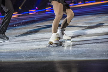 Shining led spotlights at concert with foggy background Legs of