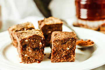 raw brownie with figs and green buckwheat, vegan diet, close-up