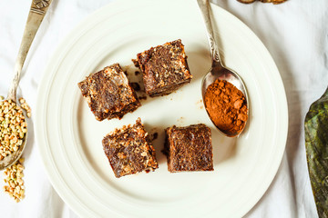raw brownie with figs and green buckwheat, vegan diet, top view