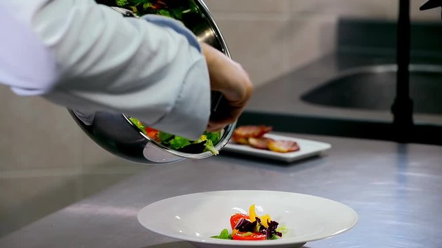 layout Salad from vegetables on a plate.