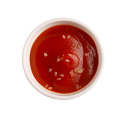Bowl of ketchup or tomato sauce isolated on white background