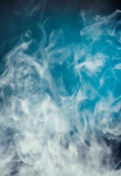smoke on blue light background © arts