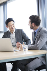 Business people talking in meeting room