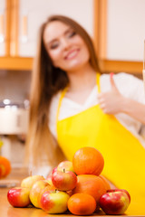 Obraz na płótnie Canvas Female cook working in kitchen.