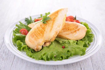 fried chicken breast and salad