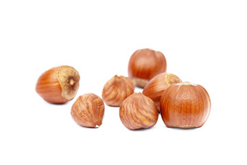 Group fresh hazelnuts isolated on white background