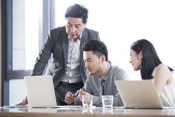 Fototapeta premium Business people talking in meeting room