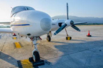 Defocus or Blur of Close up Small Airplane or Aeroplane Parked at Airport.Small Air