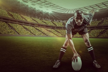 Composite image of portrait of sportsman playing rugby with 3d 