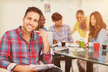 Handsome designer sit in his office