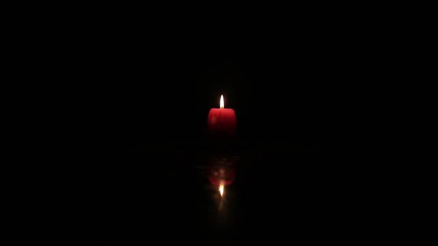 Red candle is firing as romantic scene