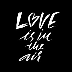 Hand lettered inspirational quote. Love is in the air. Hand brushed ink lettering. Modern brush calligraphy. Vector illustration.