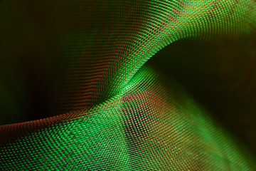 organza textile in green red, close-up of textile structure
