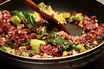 Cooking , Fried organic black rice  with Thai sour sausage and k
