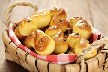 homemade swedish saffron buns, lussekatt in basket