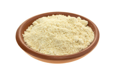 Fototapeta na wymiar Soy powder in a small bowl on a white background.