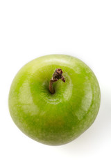 Top view of a fresh green apple against a white background