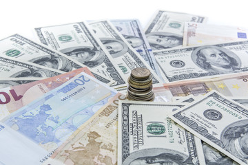 a column of coins on banknotes 