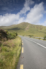Naklejka premium Open Road alongside Lough Killary Fjord Lake; Leenane, Connemara