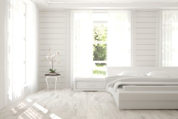 Fototapeta na wymiar White bedroom. Scandinavian interior design