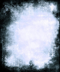 Scratched blue background with black frame and faded central area for your text or picture