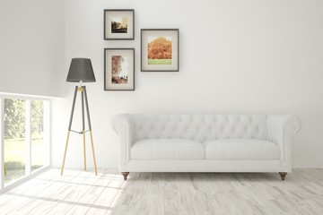 White room with sofa. Scandinavian interior design