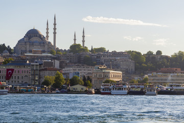 Naklejka premium Hagia Sofia & Blue Mosque Viewed from along the Bosphorus sea over the Galata Bridge.