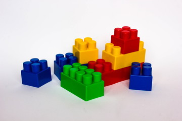 Toy building colorful blocks on white background