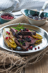 Sliced venison steak dinner