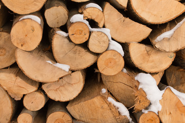 Fototapeta premium Axe chopping woods, pieces of woods ready for winter home cabin fire