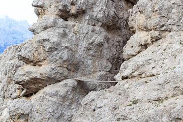 Bridge at Via Ferrata Severino Casara and Sexten Dolomites mountain panorama in South Tyrol, Italy