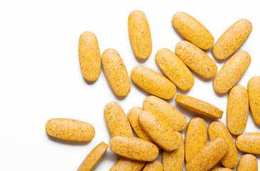 dietary supplement. multivitamin tablets on white background