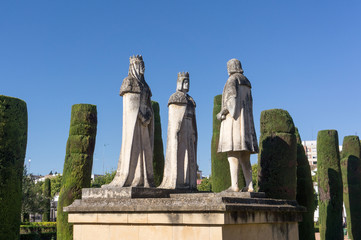 Old Stone Statues of the Christian Kings with Cristobal Colon in the gardens of the Alcazar in Cordoba Spain