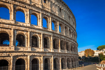 The Colosseum in Rome against splendid blue sky.