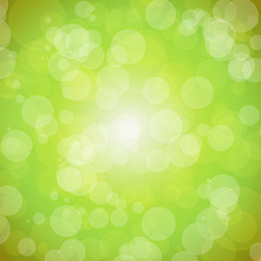 Bright green background with bokeh. Spring. Easter.