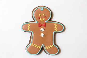 Beautiful Christmas gingerbread cookies and smiling gingerbread men. Holiday concept decorations.