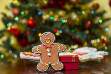 Beautiful Christmas gingerbread cookies and smiling gingerbread men. Holiday concept decorations.