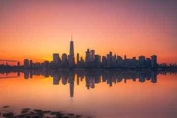 Fototapeta na wymiar Manhattan sunrise reflections 