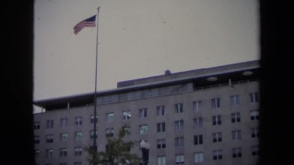 1970: the reflection of a u.s.a flag can be seen in a window WASHINGTON DC