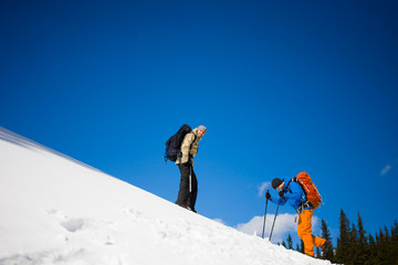 Climbers on a snow slope.