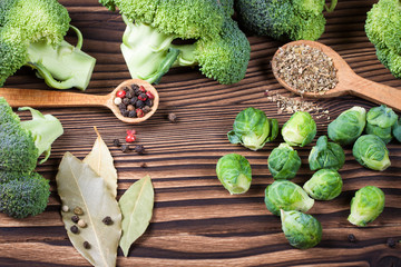 beautiful still life with herbs and spices on a wooden table. Horizontal top view