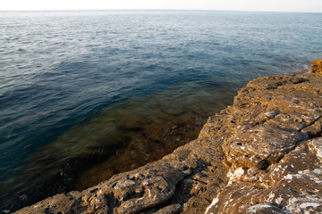 Aegean shore in Greece, Thassos island - waves and rocks - long exposure photography
